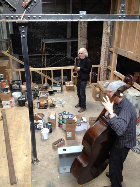 Mark Dresser and Larry Och performing while Duendes music room was still under construction. Mark Dresser and Larry Och performing while Duendes music room was still under-construction.
