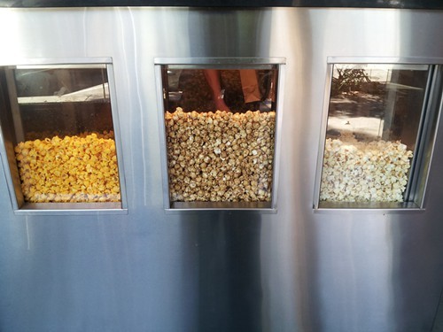 Popcorn is scooped to order, just like at a movie theater concession stand.