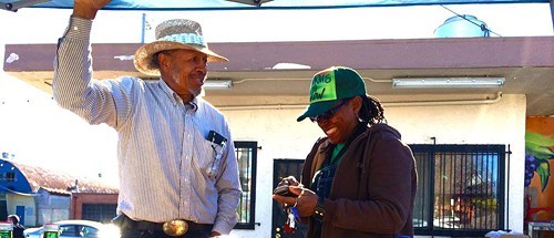 Farmer Will Scott and market organizer Gail Myers at the new Freedom Farmers Market site (via Facebook)