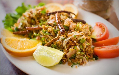 Nam kao at Vientian Cafe is meant to be eaten with your hands. Nam kao at Vientian Cafe is meant to be eaten with your hands.
