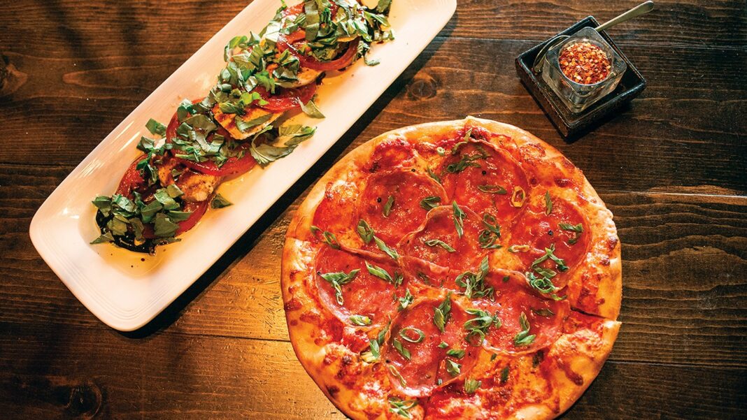 Spinning Dough Tosses ThinCrust Pizza Without Labels East Bay