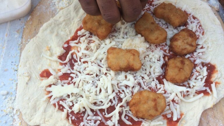 An Oven in The Village Homeless Encampment Provides Warmth and Wood-Fired Pizza