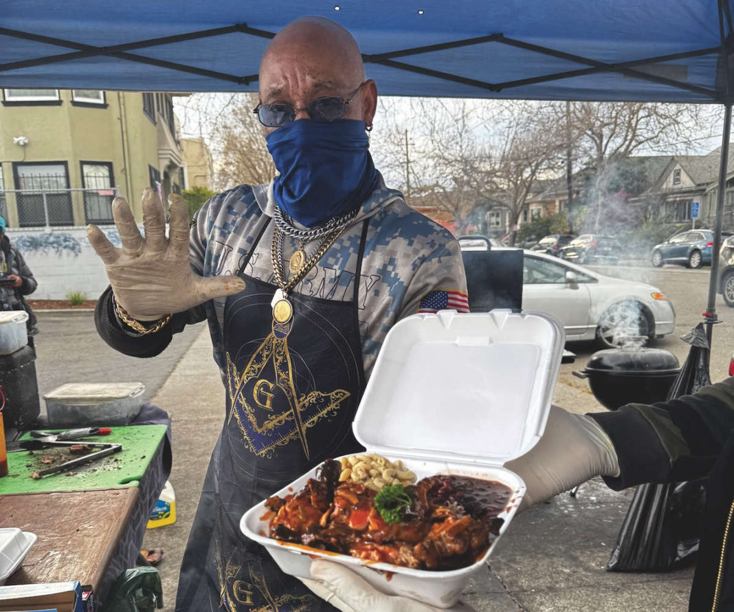 Pastor preaches at the BBQ ministry