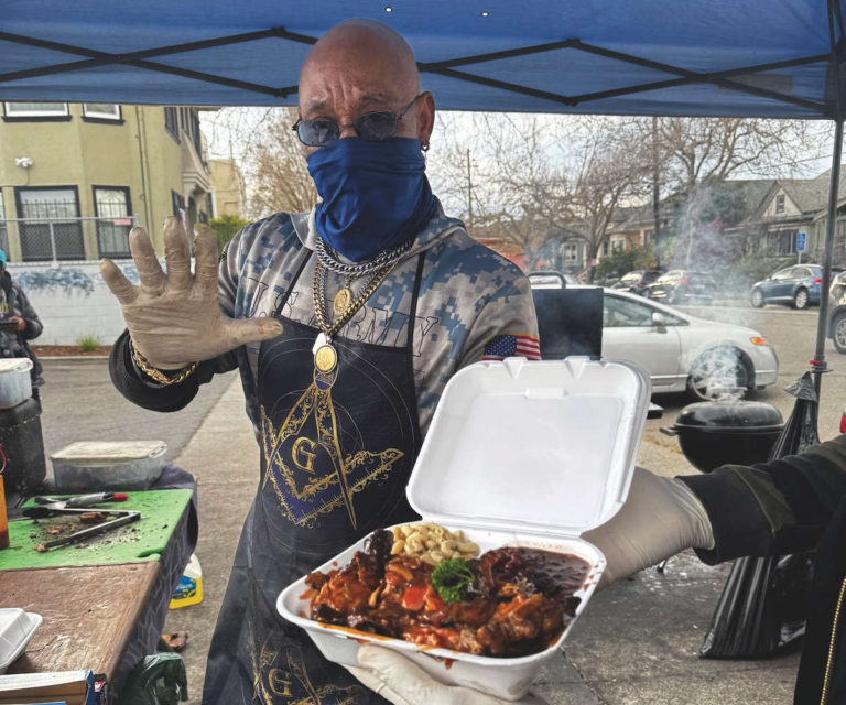 Pastor preaches at the BBQ ministry